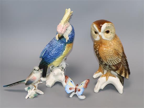 A Karl Ens cockatoo, two other model birds and a similar butterfly tallest 28cm